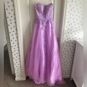 stunning strapless lavender prom dress with a adjustable tie back